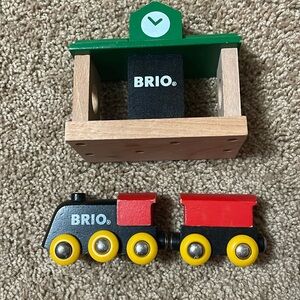 Brio train, car, and station wooden train